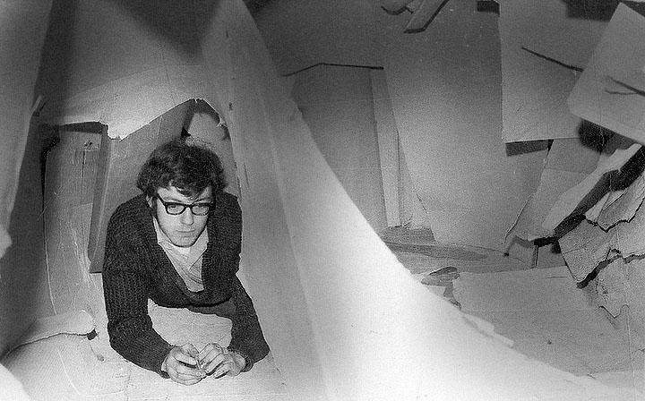 Dennis Lowe inside cardboard sculpture